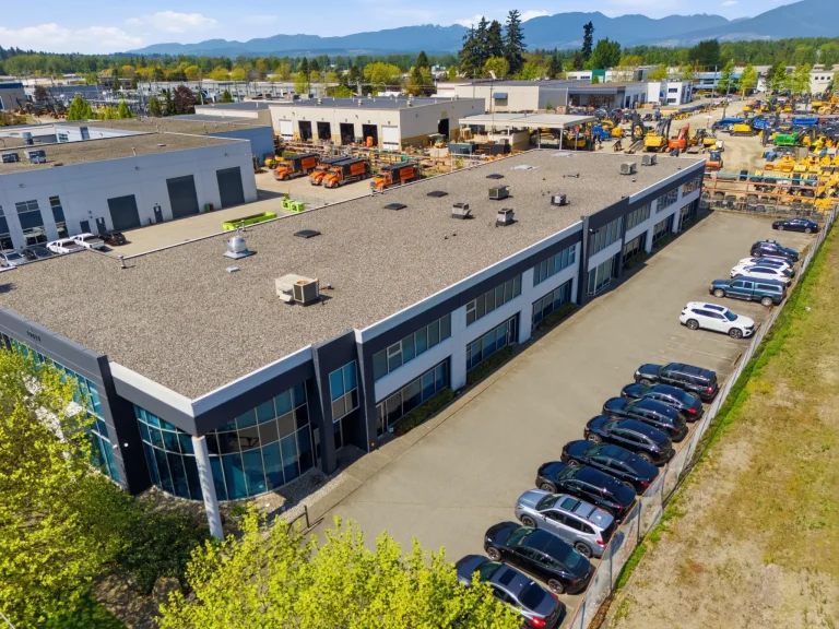 Aerial view of our building on 94th Avenue in Port Kells, Surrey, with parking along the front